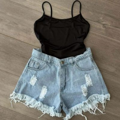 Short celeste con roturas las locas