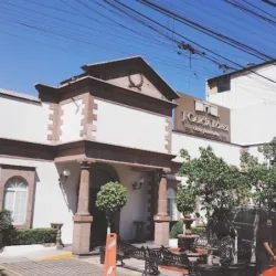 J. García López Casa Satélite